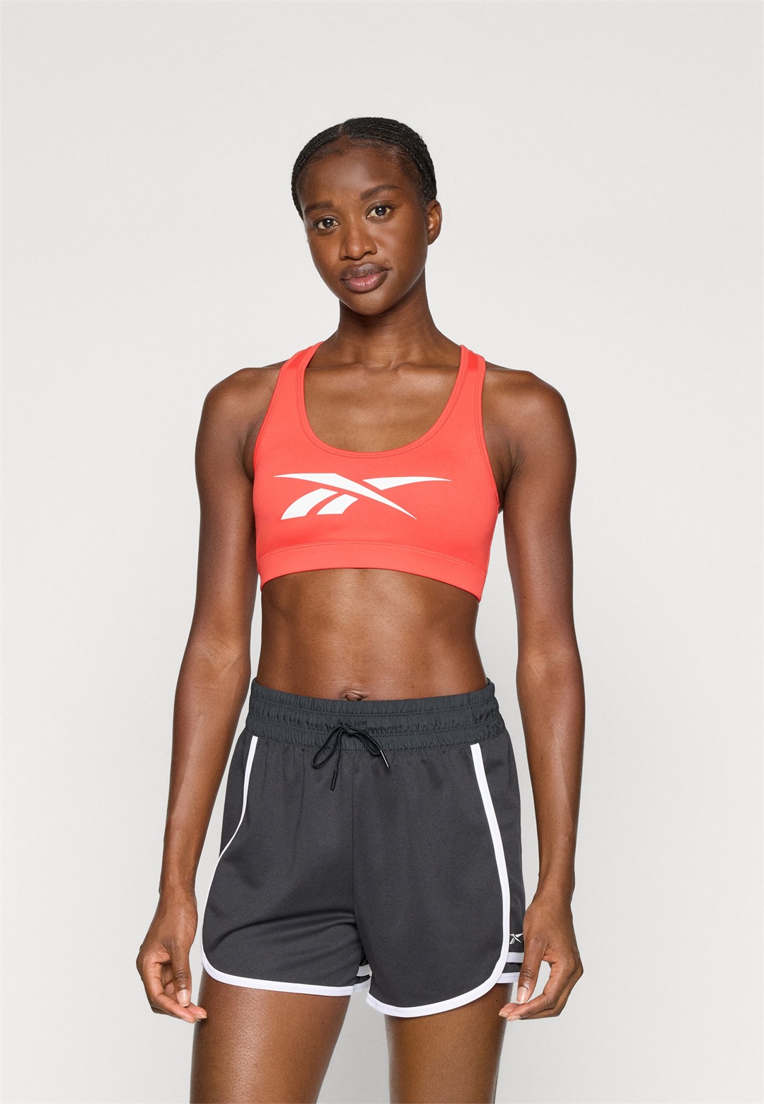 Reebok TRAIN RACERBACK BRA - Sport-BH mit mittlerer Stützkraft - energy red/rot